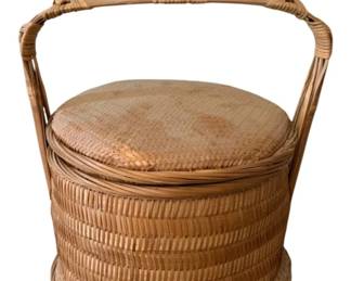 151 - Wicker Basket w/ lid 15"x12.5"x10" (Description): Woven basket with handle and lid. Measures 15  inches by 12.5 inches by 10 inches.
