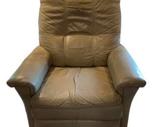 668 - La-Z-Boy Recliner 37"x33"x33" (Description): La-Z-Boy recliner in taupe leather. This  comfortable reclining chair features padded  armrests and a plush cushioned seat and back.  Measures 37 inches high by 33 inches wide by  33 inches deep. Used as is electric/electronic/mechanical  item. No guarantee all components, untested.