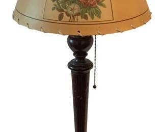 643 - Vtg Floral Shade Table Lamp 26" (Description): Vintage table lamp featuring a decorative  shade with floral motif panels. The lamp has  a turned wooden column base with a square  footed bottom and pull chain mechanism.  Measures 26 inches tall. Used as is electric/electronic/mechanical  item. No guarantee all components, untested.