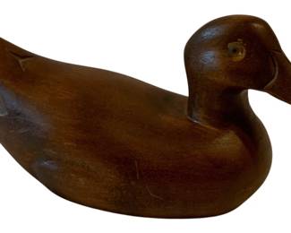 640 - Wood Duck Decoy 4"x7"x3" (Description): A carved wood duck decoy with a smooth,  polished finish. Measures 4 inches high by 7  inches wide by 3 inches long.