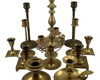 455 - Assorted Brass Candleholders (Description): A lot of brass candleholders in assorted  styles and sizes. The collection includes  various candlestick holders, a chamberstick,  and a candelabra style holder, offering a  range of decorative options.