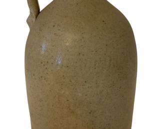 209 - Stoneware Jug 12"x7" (Description): Stoneware jug with single handle. Measures 12  inches tall by 7 inches wide.