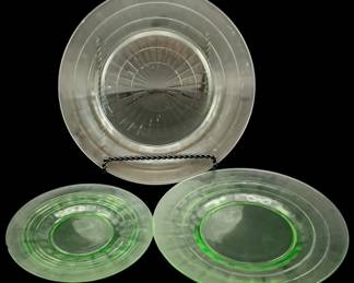 537 - 3 Uranium Green Glass Plates 9.25" (Description): A three-piece set of uranium glass plates.  Each plate measures 9.25 inches in diameter.  The translucent green glass exhibits the  characteristic glow associated with uranium  glass.
