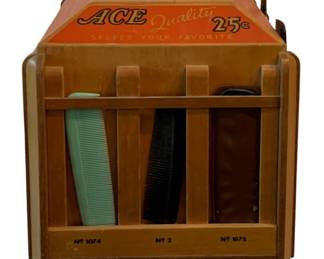 639 - Ace Comb Store Display 11"x9.25"x9.25" (Description): Vintage Ace Quality comb store display  featuring wooden construction with multiple  compartments for comb storage. The display is  marked "Select Your Favorite" with a 25 cent  price and includes numbered slots No. 1074, No. 2, and No. 1075. Measures1 inches by 9.25  inches by 9.25 inches.