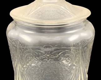 358 - Glass Biscuit Jar 7"x5.5" (Description): Glass biscuit jar with lid featuring an  embossed decorative pattern. Measures 7  inches tall by 5.5 inches in diameter.