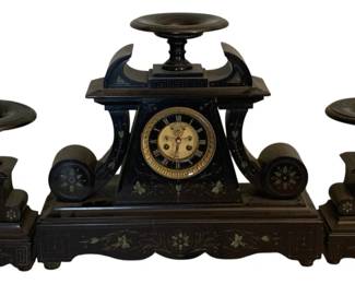 173 - 3pc Antique Clock w/ Candle Stands & Key (Description): Antique three-piece clock set with  accompanying candle stands and key. The set  features ornate decorative details  throughout. Measures 20 inches wide by 22  inches tall by 6 inches deep.