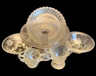 481 - Assorted Glass Items (Description): A lot of assorted glass items including  decorative bowls, a cake stand, and small  cups in various pressed glass patterns.