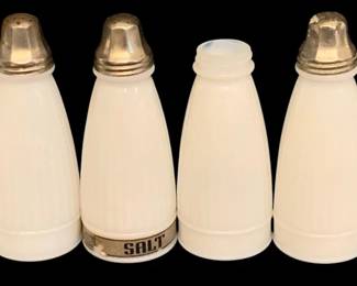 493 - 6 Milk Glass Shakers (Description): Set of six milk glass shakers, one missing  its lid. Measures 5.25 inches tall.