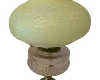 257 - Oil Lamp 23" (Description): Oil lamp measuring 23 inches in height.  Features a decorative glass font, painted  milk glass stem with floral motifs, and a  satin glass shade with etched floral and  lattice design.