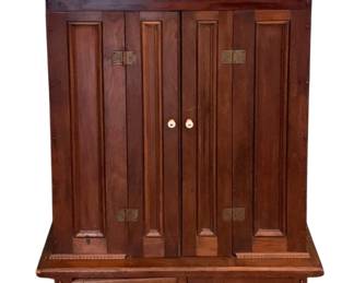 176 - Antique Wood Cabinet 35.5"x27.5"x9" (Description): Antique wood cabinet featuring paneled double  doors with decorative brass hinges and  porcelain knobs. The cabinet includes two  small drawers at the base with matching  porcelain pulls. Carved molding details accent the top and bottom edges. Measures35  1/2" x 27.5" x 9".