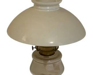 751 - Oil Lamp 20" tall (Description): Oil lamp measuring 20 inches tall. Features a  white milk glass shade with a clear glass  chimney, brass burner mechanism, and a clear  glass font on a white glass base.