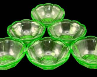 378 - 6 Uranium Green Glass Bowls 2"x4.75" (Description): A six-piece set of uranium glass bowls. Each  bowl measures 2 inches tall by 4.75 inches in  diameter.