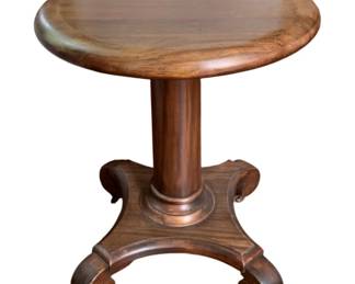 40 - Wood Table/stand 30"x26" (Description): A wood table featuring a round top supported  by a central pedestal column on a shaped base  with scrolled feet. Measures 30 inches by 26  inches.