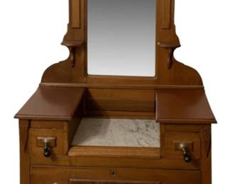 788 - Antique Chest w/ Mirror 77"x35.5"x18" (Description): Antique chest with mirror. The piece features  a decorative carved crest on the mirror  frame, marble inset surface, and multiple  drawers with turned wooden pulls. Measures  77" x 35.5" x 18".