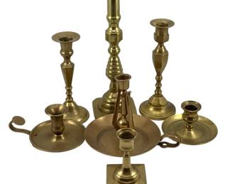 475 - Assorted Brass Candleholders (Description): A lot of brass candleholders in various  styles and sizes. The collection includes  tall turned candlesticks, chamber sticks with  handles, and other decorative forms suitable  for displaying candles.