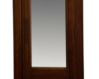 611 - Antique Wardrobe 83.5"x42.5"x20" (Description): Antique wardrobe featuring a single mirrored  door and lower drawer with brass hardware.  The piece showcases classic woodwork with a  warm finish and crown molding detail at the  top. Measures 83.5 inches high by 42.5 inches wide by 20 inches deep.