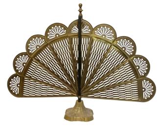 745 - Brass Fireplace Screen 28"x39"x7" (Description): Brass fireplace screen featuring a decorative  fan design with pierced metalwork. Measures  28 inches wide by 39 inches tall by 7 inch  deep.