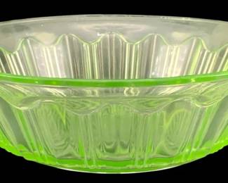 330 - Uranium Green Glass Bowl 2.5"x8.75" (Description): Uranium glass bowl featuring a ribbed pattern  design. Measures 2 1/2 inches tall by 8.75  inches in diameter.