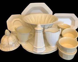 514 - Assorted China (Description): A lot of assorted china pieces in white and  cream tones, including serving bowls,  platters, cups, a creamer, a shaker, and  small decorative vessels.