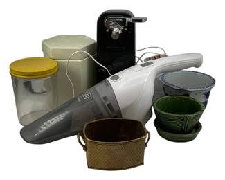 502 - Assorted Household Lot Items (Description): An assorted lot of household items including  various containers, small appliances, and  decorative pieces.
