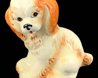 414 - Ceramic Dog Piggy Bank 7.5"x9"x4" (Description): Ceramic dog piggy bank featuring a seated  puppy design with hand-painted details.  Measures 7 1/2 inches by 9 inches by 4  inches.