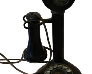 130 - Antique Candlestick Phone 13"x7"x5" (Description): Antique candlestick phone featuring the  classic upright design with a rotary dial at  the base and separate earpiece on a hook.  This vintage telephone measures 13 inches by  7 inches by 5 inches.