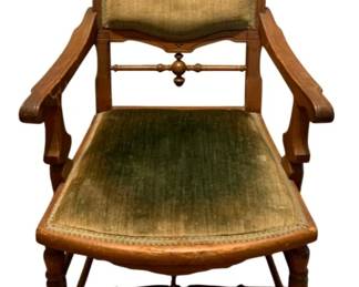 678 - Antique Chair 39"x22"x22" (Description): Antique chair featuring a carved wooden frame  with turned legs and decorative spindle  details. The chair has upholstered back and  seat cushions. Measures 39 inches high by 22  inches wide by 22 inches deep.