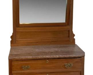711 - Antique Dresser w/ Mirror 82"x41"x18.5" (Description): Antique dresser with mirror featuring a  marble top and ornate brass drawer pulls. The  piece has three spacious drawers and a  decorative carved crest above the mirror.  Measures 82 inches tall by 41 inches wide by 18.5 inches deep.