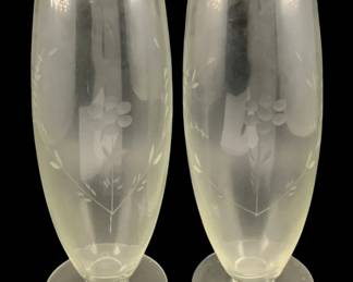 400 - Pair of Etched Glass Vases 10.25"x4" (Description): A two-piece set of etched glass vases  featuring delicate floral and leaf designs.  Each vase measures 10 1/4 inches tall by 4  inches wide.