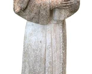 15 - Concrete Statue 30"x9"x7" (Description): Concrete statue depicting a robed figure with  crossed arms. The statue shows weathered  patina consistent with outdoor use. Measures  30 inches tall by 9 inches wide by 7 inches  deep.