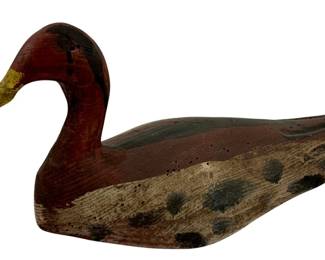 432 - Wood Duck Decoy 6"x13"x5.5" (Description): Wood duck decoy featuring hand-painted  details. The decoy measures 6 inches high by  13 inches long by 5.5 inches wide.
