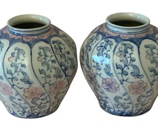 172 - 2 Ceramic Vases 7"x7" (Description): A two-piece set of ceramic vases featuring  decorative floral and foliate designs. Each  vase measures 7 inches by 7 inches.