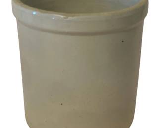 230 - Stoneware Crock 8"x7" (Description): Stoneware crock measuring 8 inches by 7  inches. This utilitarian piece features a  classic cylindrical form with a rolled rim,  finished in a traditional cream-colored  glaze.