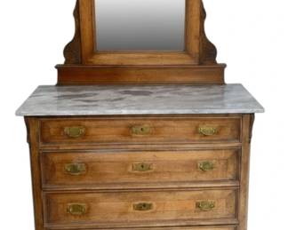 730 - Marble-Top Chest w/ Mirror 73"x45.5"x20" (Description): Marble-top chest with mirror. This handsome  piece features a wooden chest of drawers  topped with a marble surface and an attached  mirror with decorative wooden frame. The  chest has four drawers with brass hardware and rests on turned feet. Measures 73 inches  high by 45.5 inches wide by 20 inches deep.