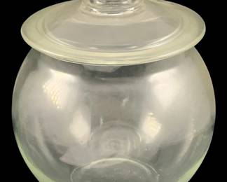 401 - Vintage Clear Glass Jar w/ Lid 10"x7.5" (Description): Glass jar with lid. The jar features a round,  bulbous body with a fitted lid topped by a  knob finial. Measures 10 inches by 7.5  inches.
