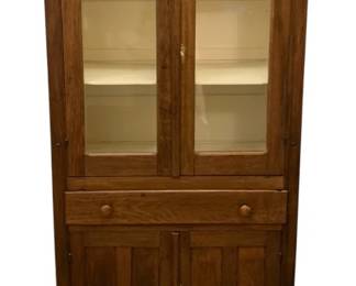 624 - Acme Antique Cabinet 72"x34"x15" (Description): Acme antique cabinet featuring a two-door  glass-front upper section with interior  shelving, a single drawer, and a two-door  lower cabinet. Measures 72 inches tall by 34  inches wide by 15 inches deep.