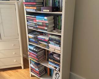 Solid wood bookcase , books not included . $60