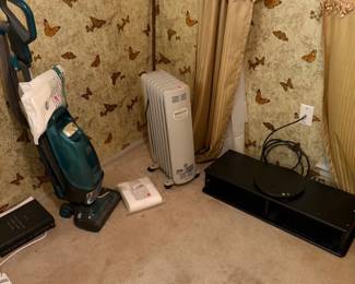 Vacuum, heater, top piece for ent center, swivels