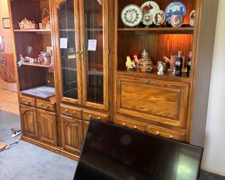 China Hutch (lighted) and large tv