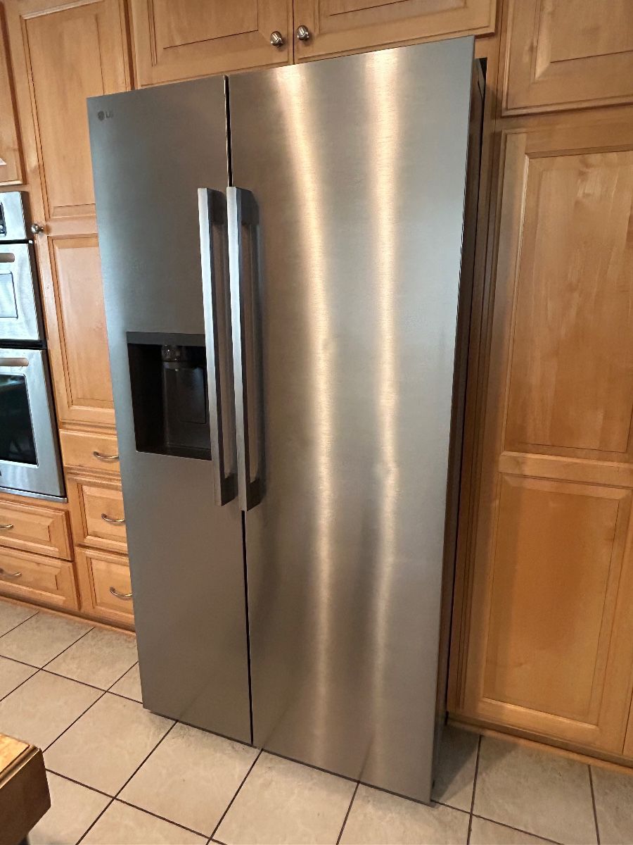 LG refrigerator. Mfg date-06/2025. In use for 1 year. Clean and ice cold.
