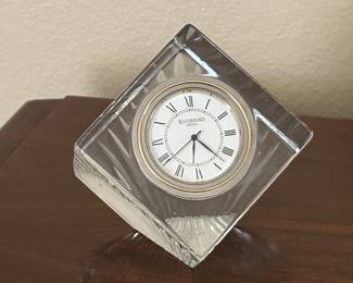 Waterford Crystal clock, wine glasses and candle holders.
