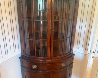 Drexel bowfront corner cabinet