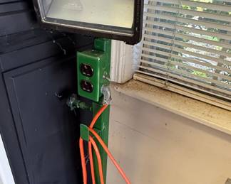 Portable Halogen Work Light with Integrated Power Outlet
