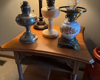 Collection of Three Vintage Lamps: Metal Oil Lamp, Milk Glass Oil Lamp, and Floral Electrified Lamp