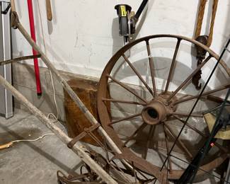 Antique Hand Cultivator and Spoked Wagon Wheel