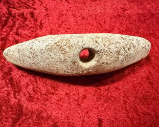 This is a stone used in throwing arrows and spears pre-Colombian