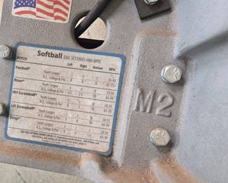 Softball pitching machine