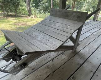 Primitive wooden wheel barrow