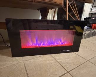 Electric wall fireplace - changes colors 