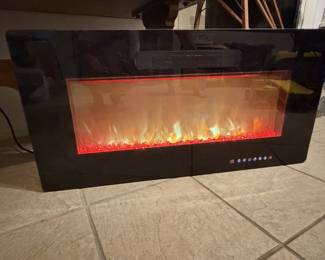 Electric wall fireplace - changes colors 